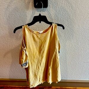 Mustard colored blouse,
Peek
A
Boo
Shoulder
Cutouts